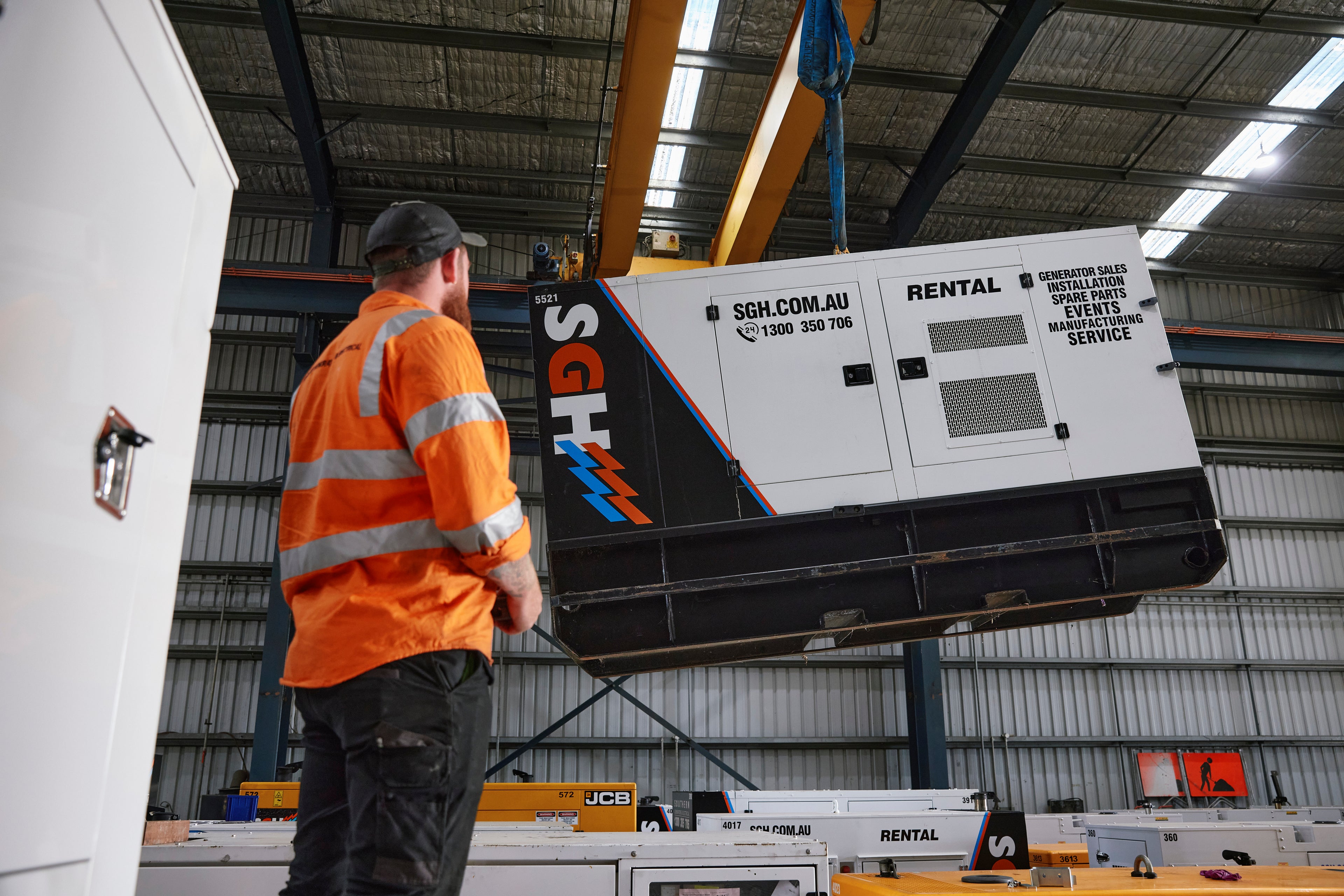 sgh employee moving rental generator in the warehouse